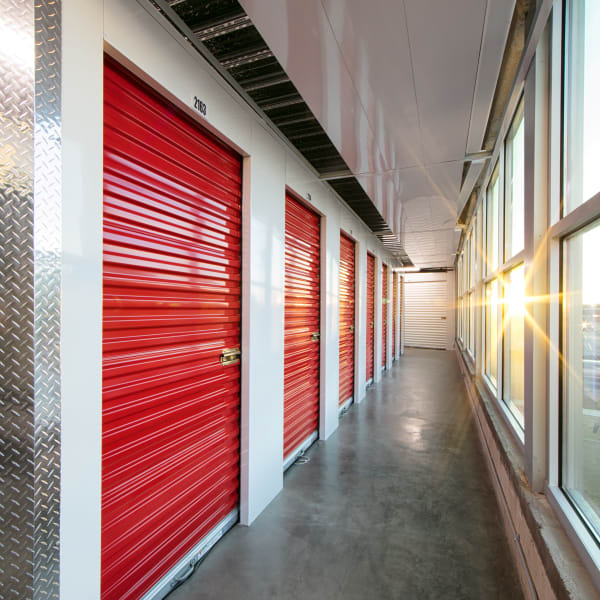 Red doors on indoor units at StorQuest Self Storage in Anaheim, California