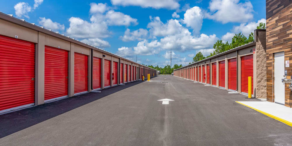 Outdoor drive-up storage units at StorQuest Express Self Service Storage in Palm Coast, Florida