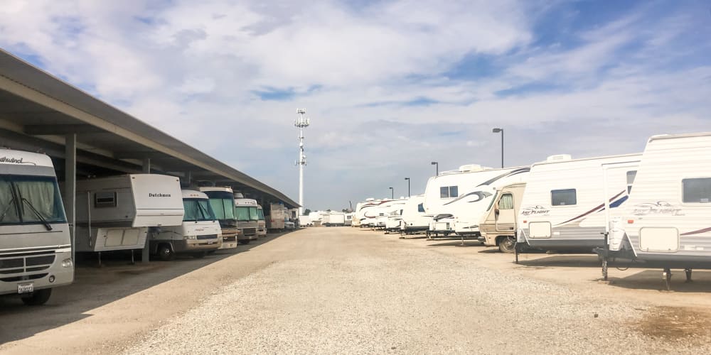 RV, boat, and auto parking at StorQuest RV and Boat Storage in Moreno Valley, California