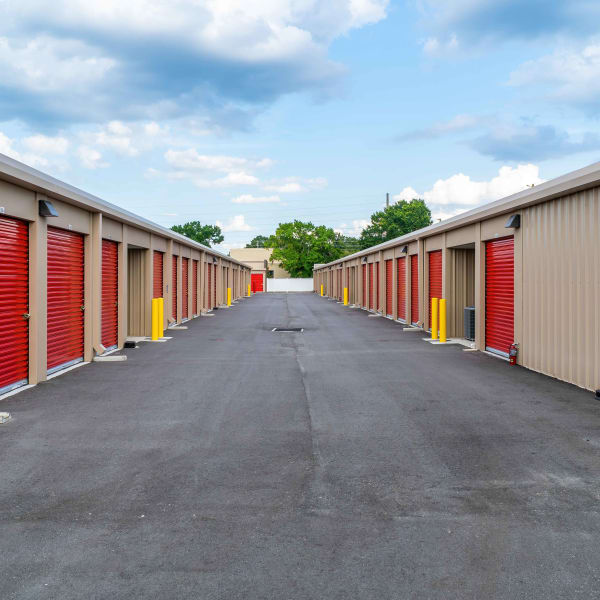 Outdoor storage units with bright doors at StorQuest Express Self Service Storage in Kissimmee, Florida