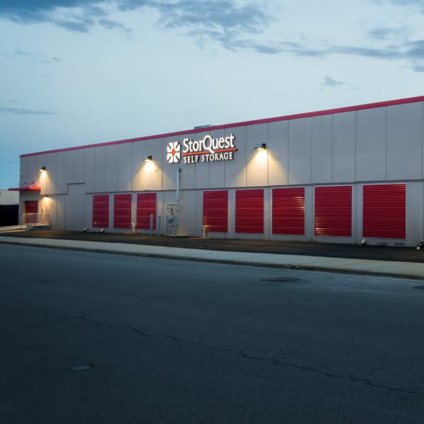 Exterior storage units with red doors at StorQuest Self Storage in Long Beach, New York