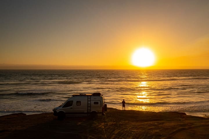 Sean C. watching a sunset 