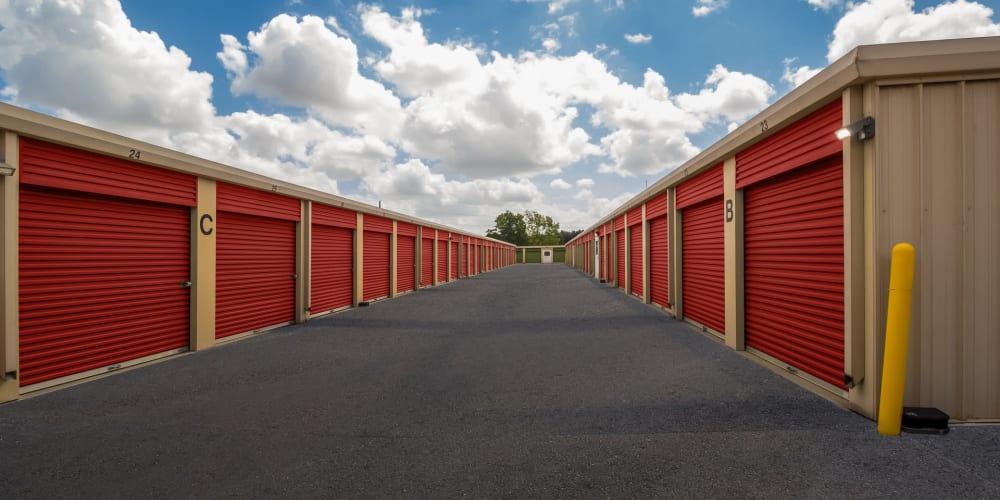 Outdoor storage units with drive-up access at StorQuest Self Storage in Sugar Land, Texas