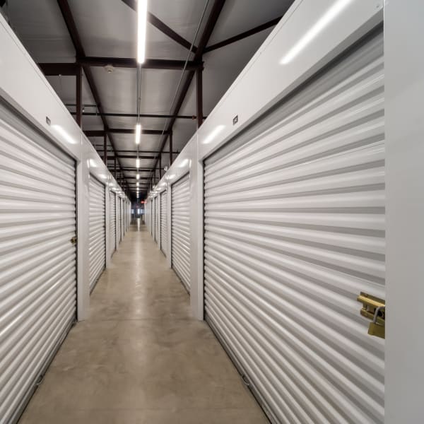 White doors on indoor climate controlled storage units at StorQuest Self Storage in Venice, Florida