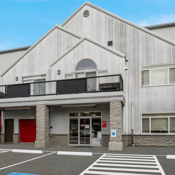 Drive up storage units outside the leasing office at StorQuest Self Storage in Renton, Washington