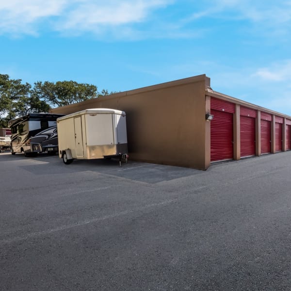 RVs, boats, trucks, and trailers parked at StorQuest Self Storage in Sarasota, Florida