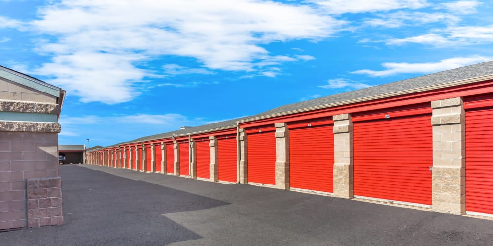 A row of drive-up storage units of StorQuest Self Storage in Parker, Colorado