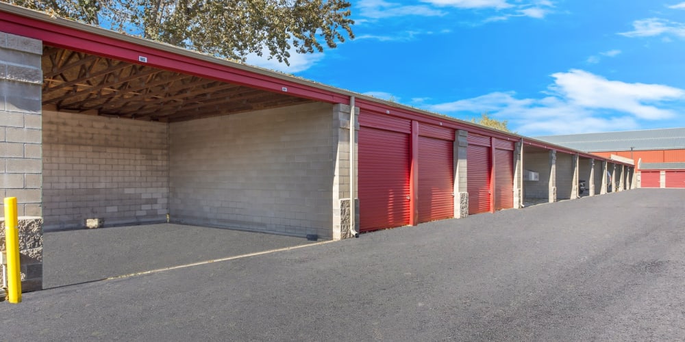 Outdoor storage units and covered parking at StorQuest Self Storage in Parker, Colorado