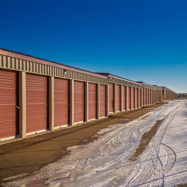 Outdoor storage units with wide drive aisles at StorQuest Self Storage in Williston, North Dakota