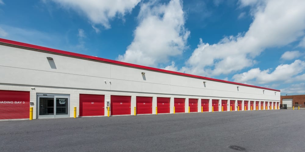 Outdoor drive-up self storage units at StorQuest Self Storage in Deer Park, New York