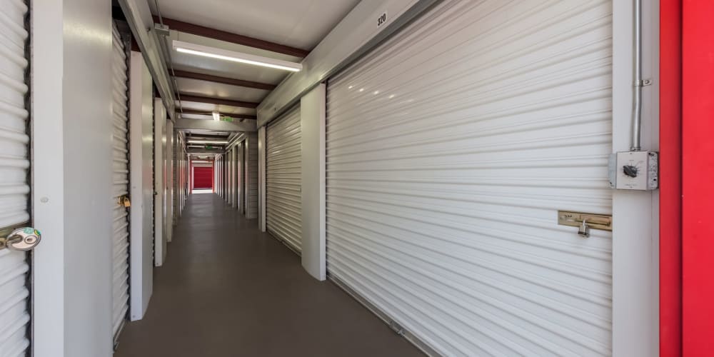 Large indoor storage units at StorQuest Self Storage in Apache Junction, Arizona