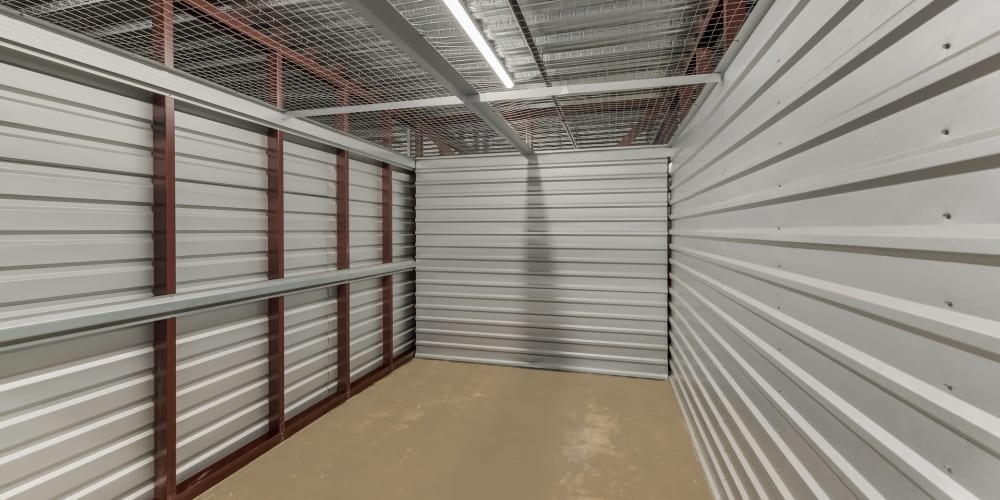 Inside a large climate-controlled unit at StorQuest Self Storage in Deer Park, New York