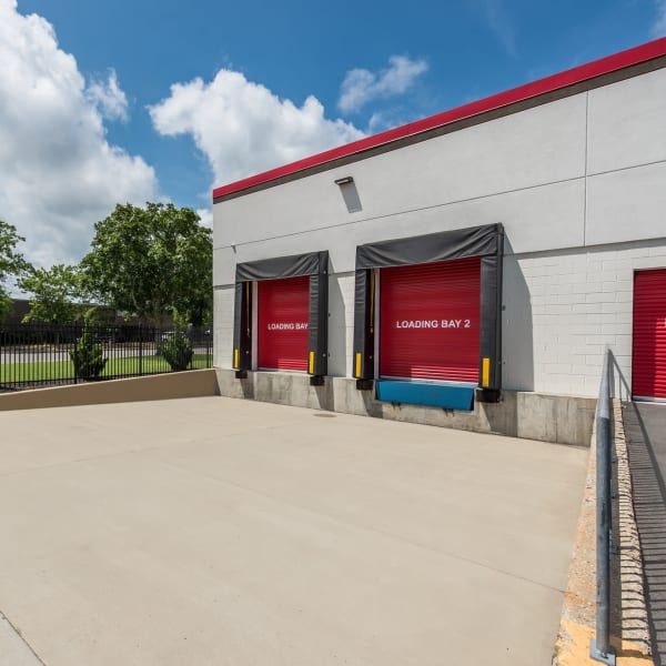 Loading bays for large scale storage at StorQuest Self Storage in Deer Park, New York