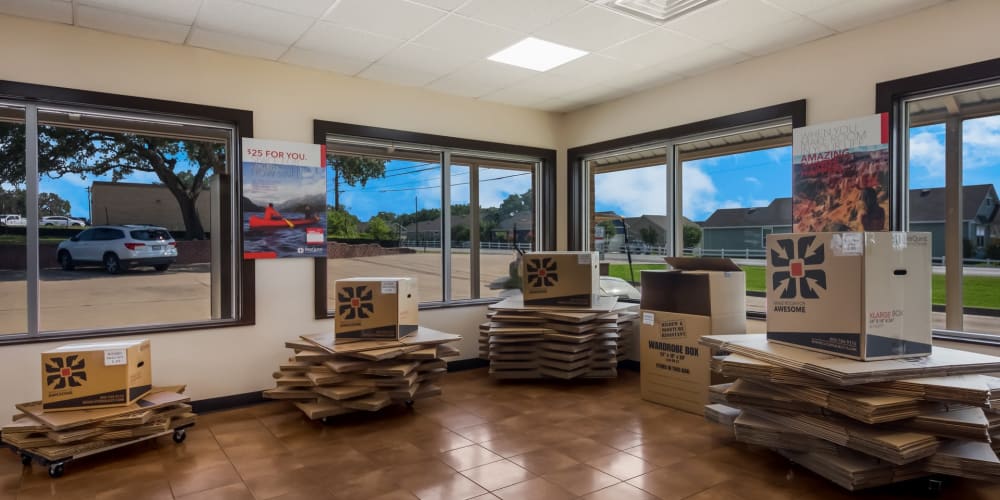 The leasing office with packing supplies available at StorQuest Self Storage in Kyle, Texas